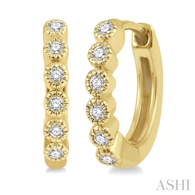 Ladies large diamond earrings-1/10 Ctw Round Cut Diamond Huggie Earrings in 10K Yellow Gold