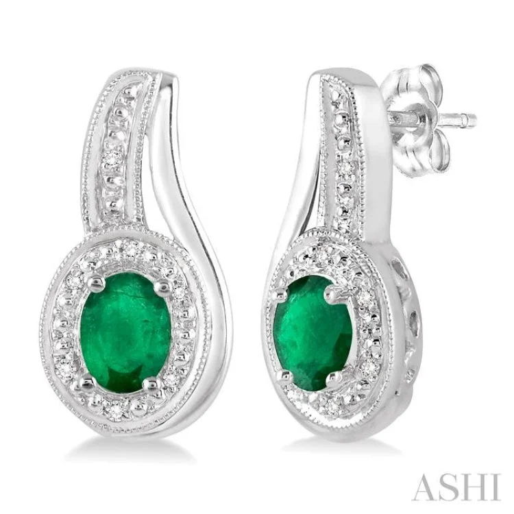 Ladies clip-on earrings-5x3 MM Oval Cut Emerald and 1/50 Ctw Round Cut Diamond Earrings in Sterling Silver