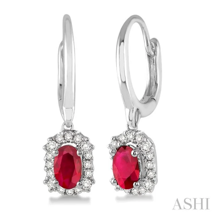 Ladies birthstone drop earrings-5x3 MM Oval Cut Ruby and 1/6 Ctw Round Cut Diamond Earrings in 14K White Gold