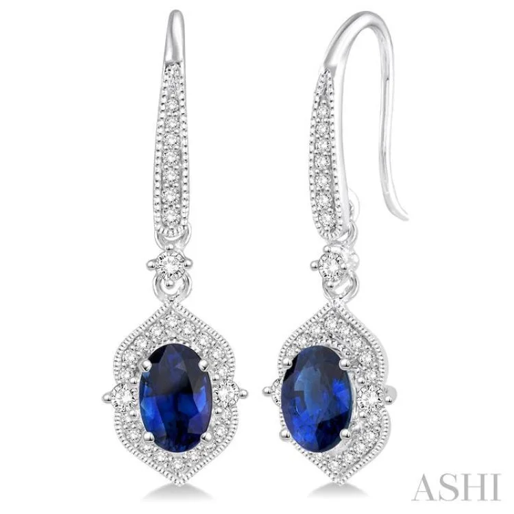 Ladies birthstone drop earrings-5x3 MM Oval Shape Sapphire and 1/3 Ctw Round Cut Diamond Earrings in 14K White Gold