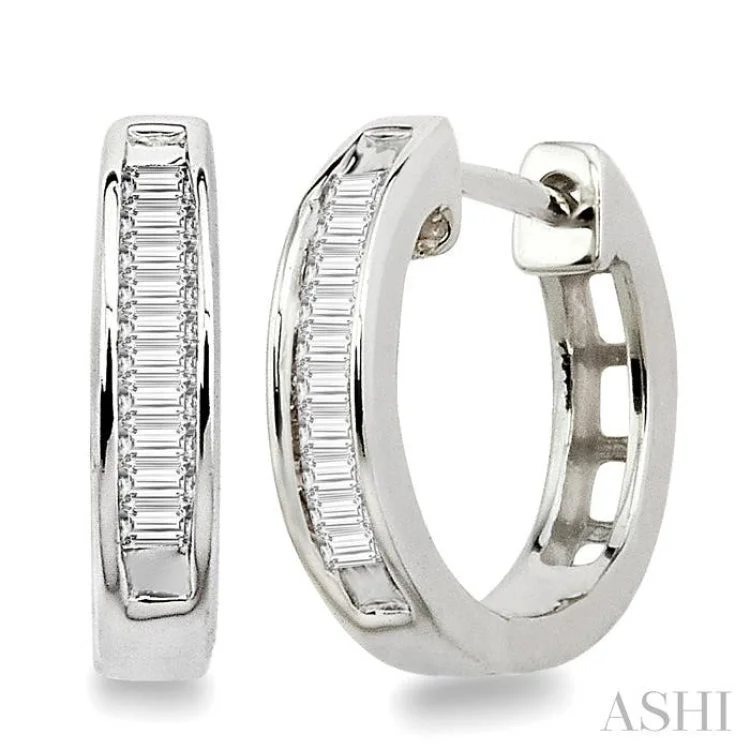 Ladies sterling silver earrings-1/10 Ctw Baguette Cut Diamond Huggie Earrings in 10K White Gold