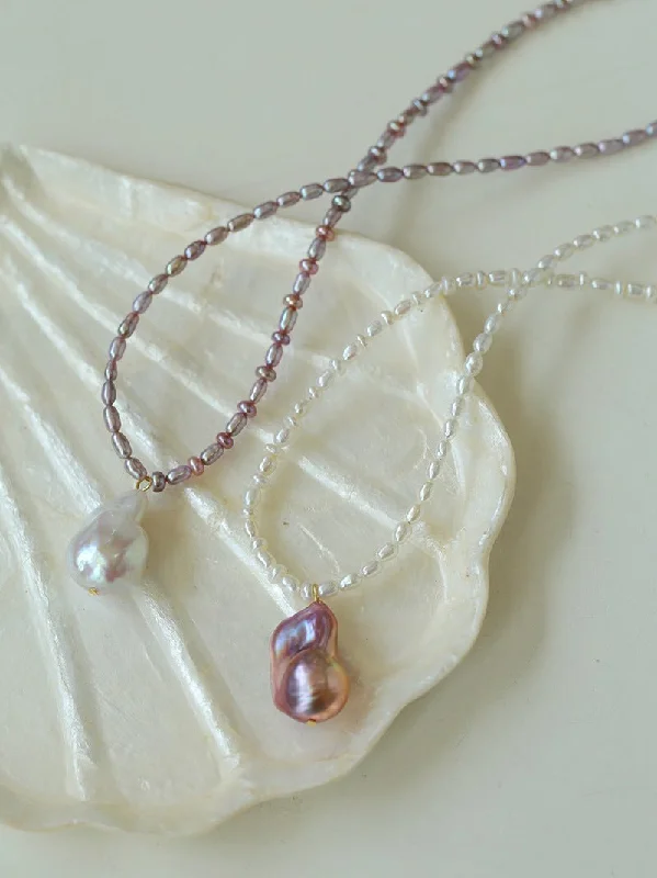 Ladies precious gemstone necklace-Rice Pearl and Purple Baroque Pearl Pendant Necklace