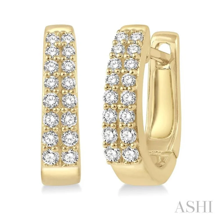 Ladies stud earrings with gemstones-1/3 Ctw Round Cut Diamond Petite Huggie Earrings in 14K Yellow Gold