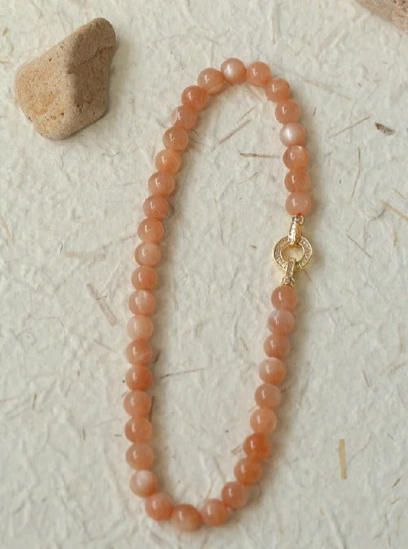 Ladies gold chain necklace-Smooth Round Sunstone Beaded  Choker Necklace