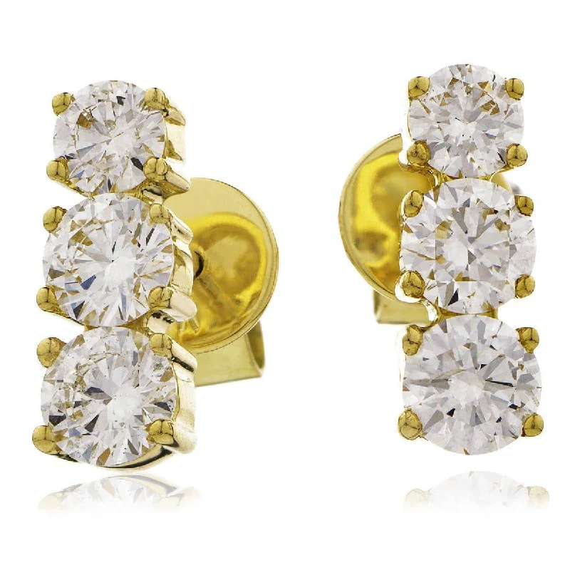 Ladies custom earrings-DIAMOND TRILOGY DROP EARRINGS IN 18K YELLOW GOLD