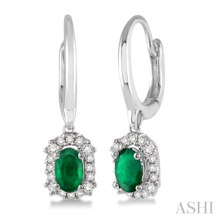 Ladies gold drop earrings-5x3 MM Oval Cut Emerald and 1/6 Ctw Round Cut Diamond Earrings in 14K White Gold