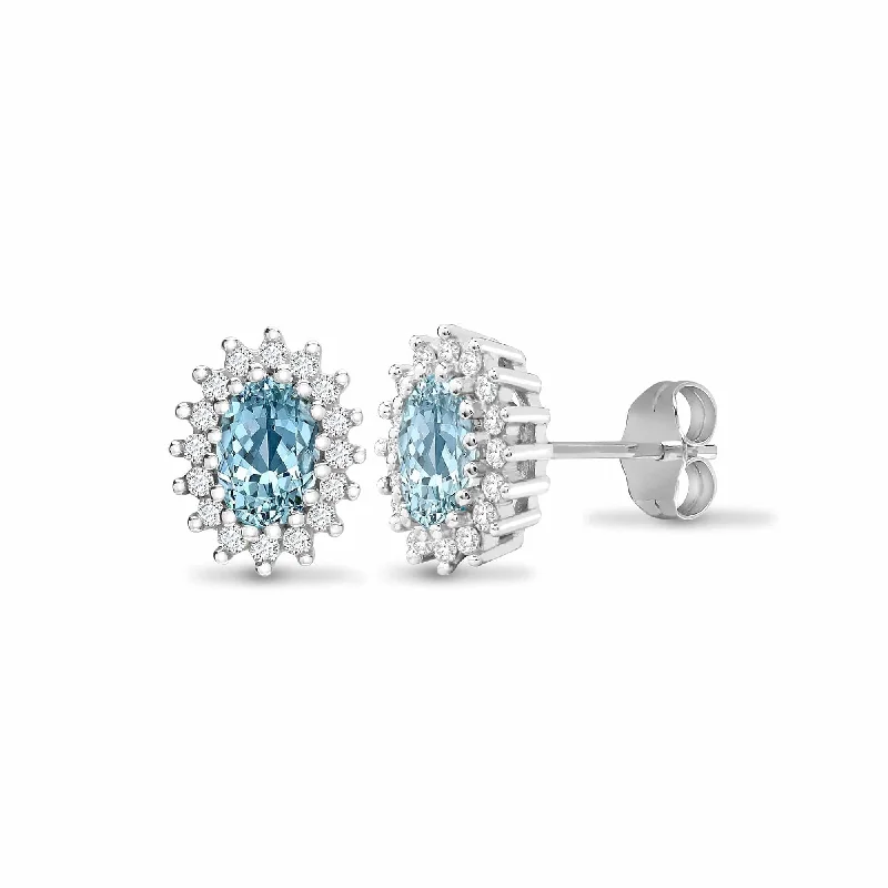 Ladies bridal earrings-BLUE TOPAZ HALO STUD EARRINGS IN 9K WHITE GOLD