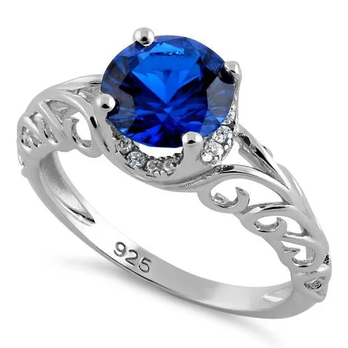 Ladies gold eternity ring-Sterling Silver Swirl Design Blue Spinel and Clear CZ Ring