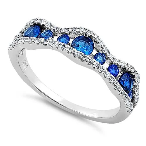 Ladies diamond eternity band-Sterling Silver Cascading Wave Round Cut Clear & Blue Spinel CZ Ring